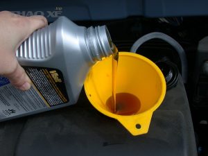 Motor oil refill with funnel 6