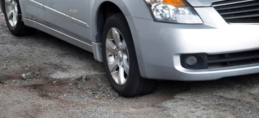 Cân chỉnh góc đặt bánh sau sửa hệ thống treo để xử lý triệt để tiếng kêu gầm